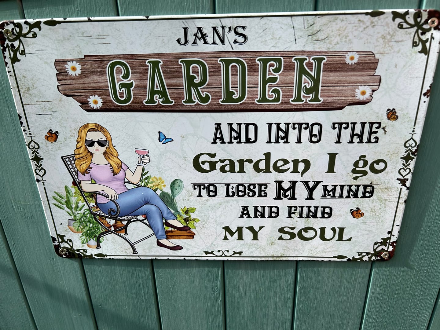 Customer photo review of And Into The Garden I Go Gardening Girl - Garden Sign - Personalized Custom Classic Metal Signs