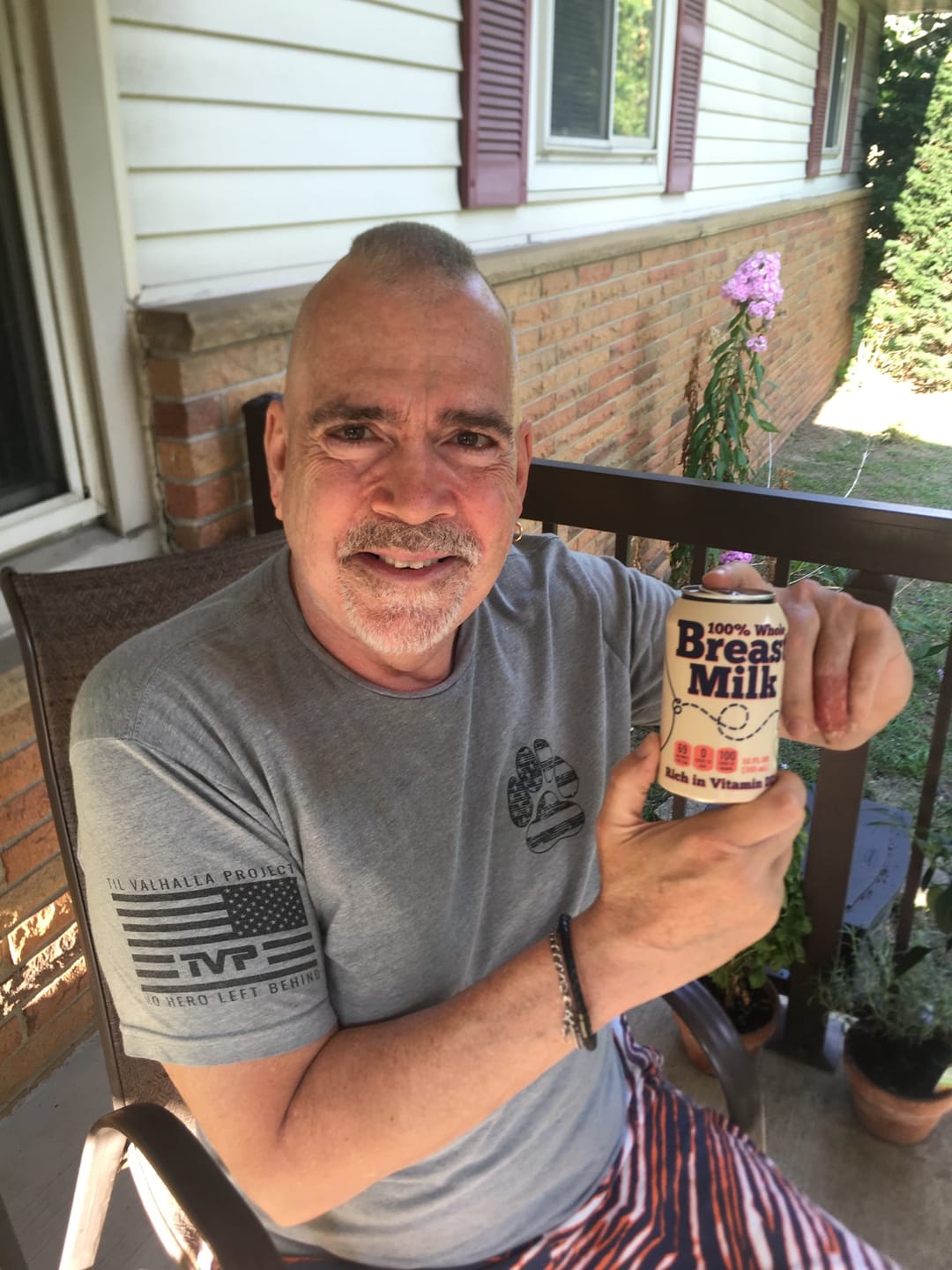 Customer photo review of Breast Milk Beersy Silicone Sleeve Hide-a-Beer Can Cooler