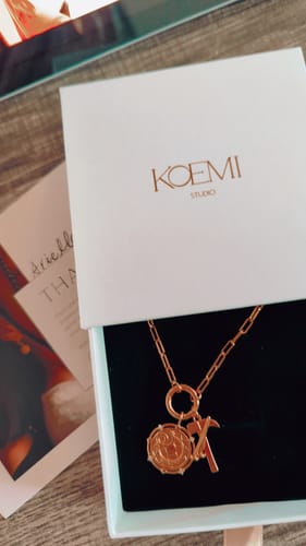Customer photo review of Strength & Spirit Charms