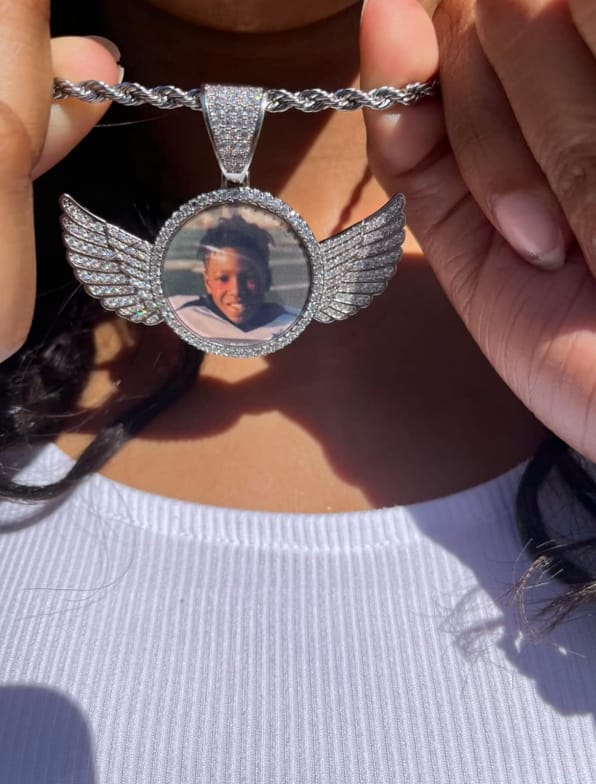 Customer photo review of ANGEL VIRTUE-WINGS CUSTOM PHOTO NECKLACE