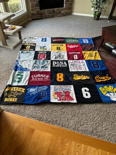 T-shirt quilt with sports, outdoors themes by Peggy from NE