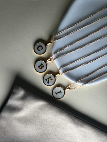 Customer photo review of Collar de inicial Acero inoxidable