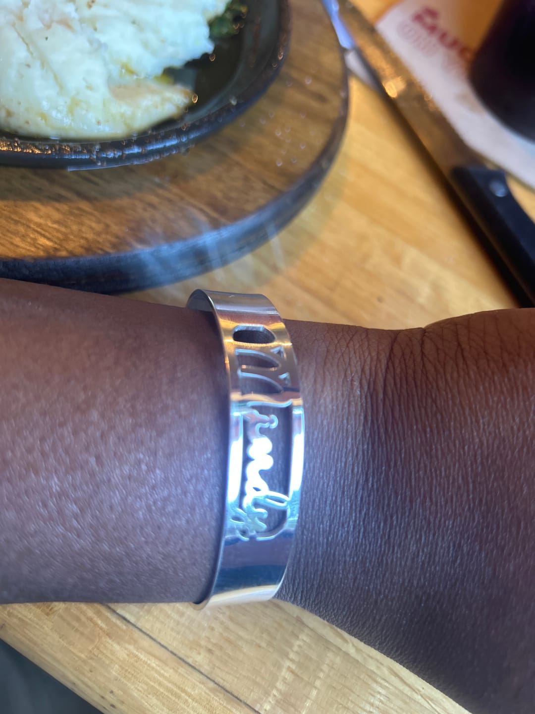 Customer photo review of Cutout Script Name Bangle