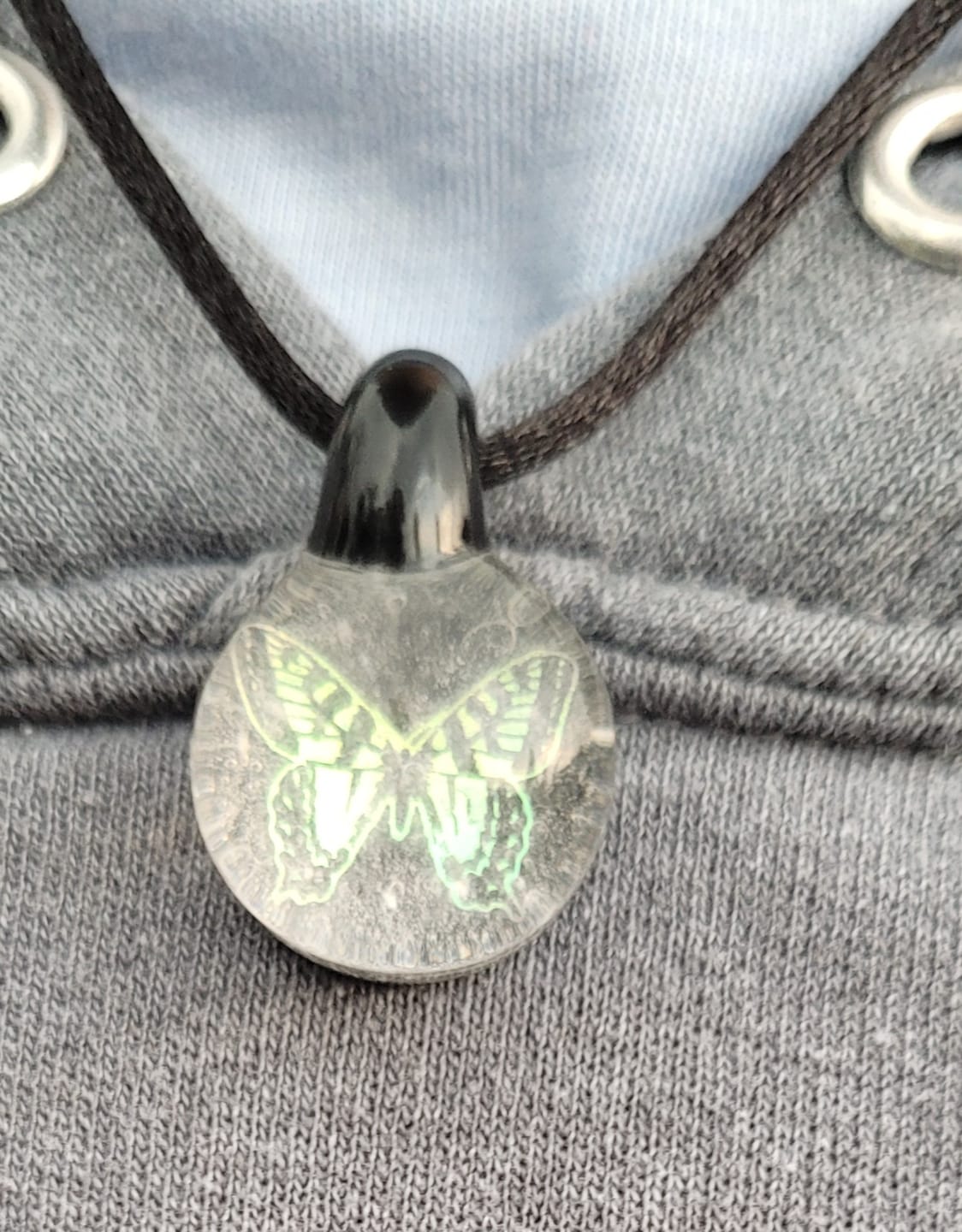 Customer photo review of Butterfly Hologram Pendant with Infused Cremation Ash