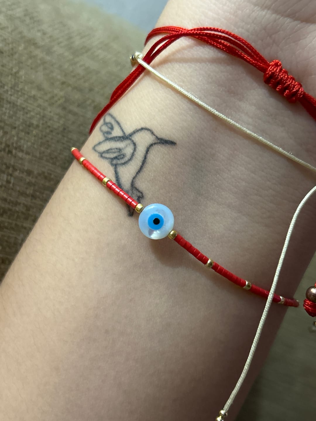Customer photo review of Pulsera Chaquiras Con Ojo Transparente