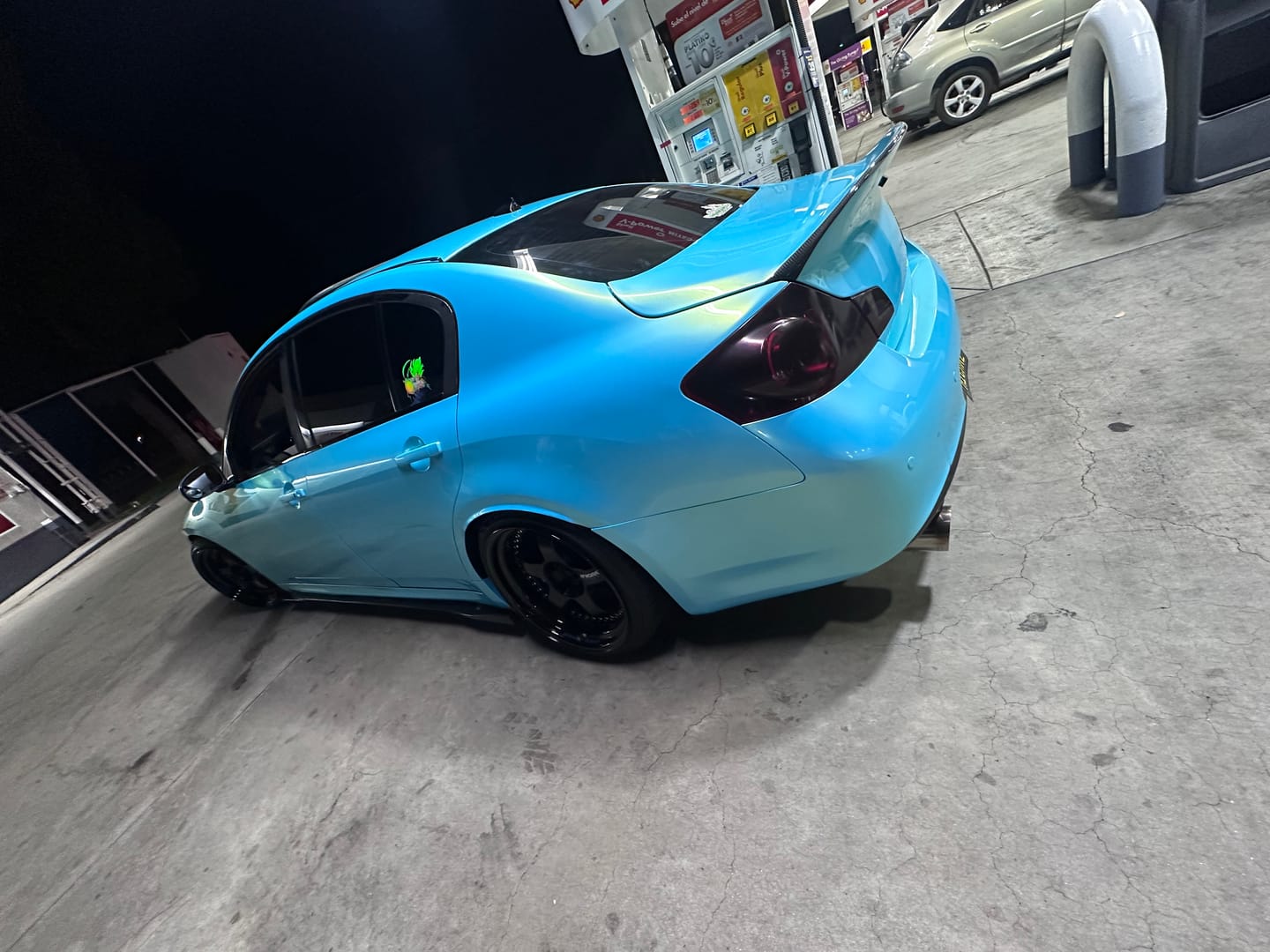 Customer photo review of Candy Metallic Neon Ice Blue Vinyl Wrap