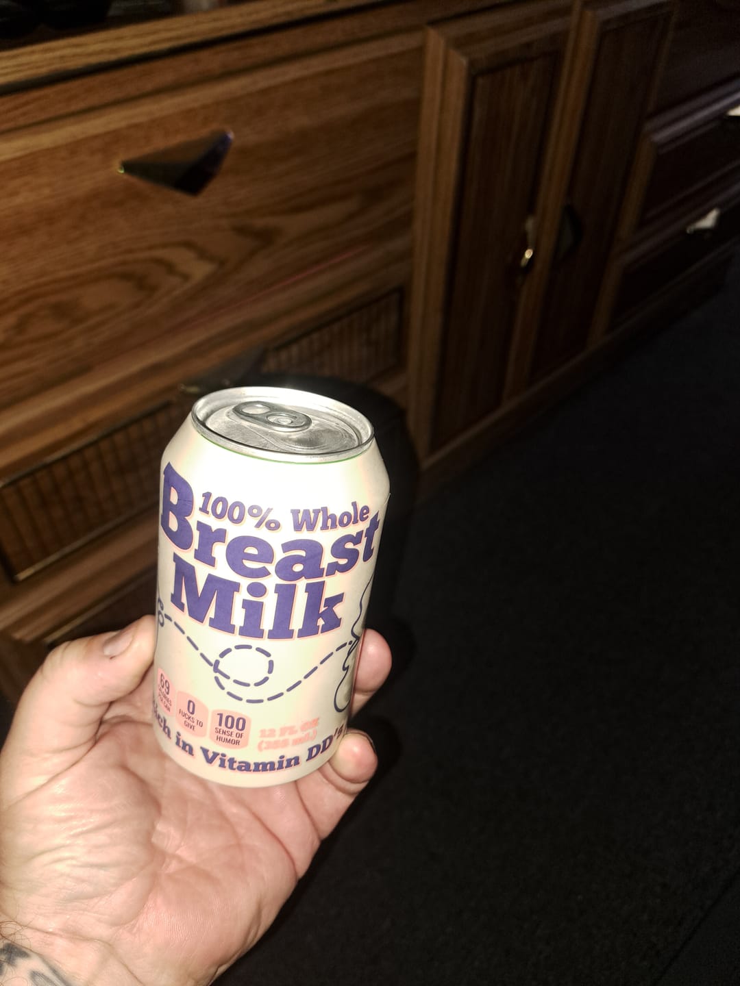 Customer photo review of Breast Milk Beersy Silicone Sleeve Hide-a-Beer Can Cooler