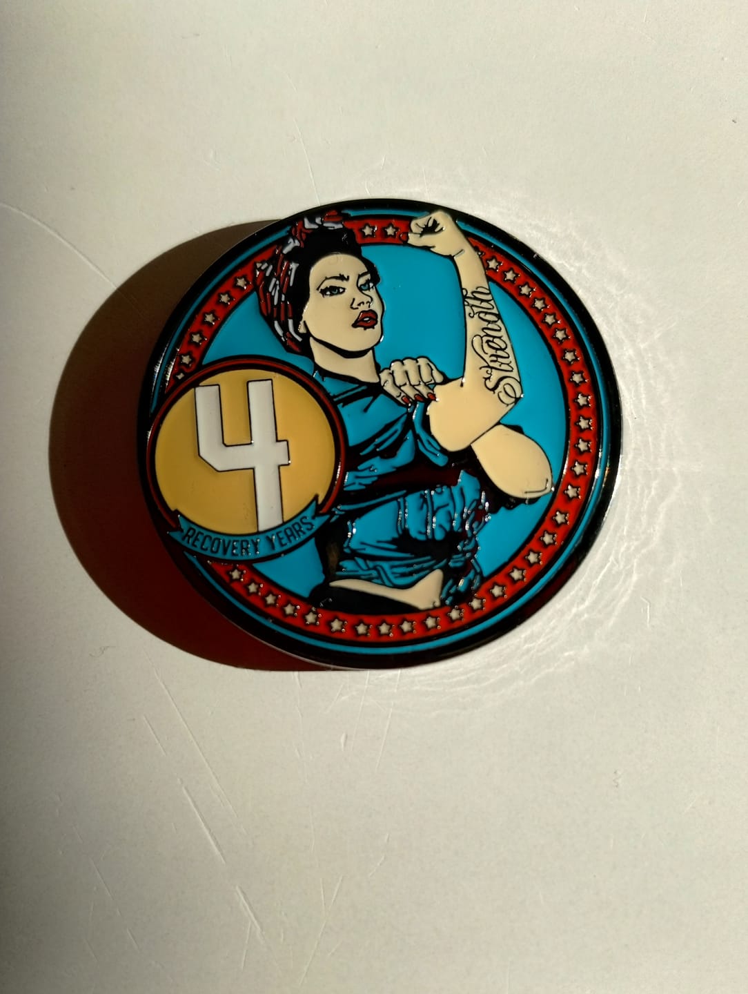 Customer photo review of Rosie Recovery Strength 4 Year AA/NA Medallion - Tri-Plate Four Year Chip/Coin