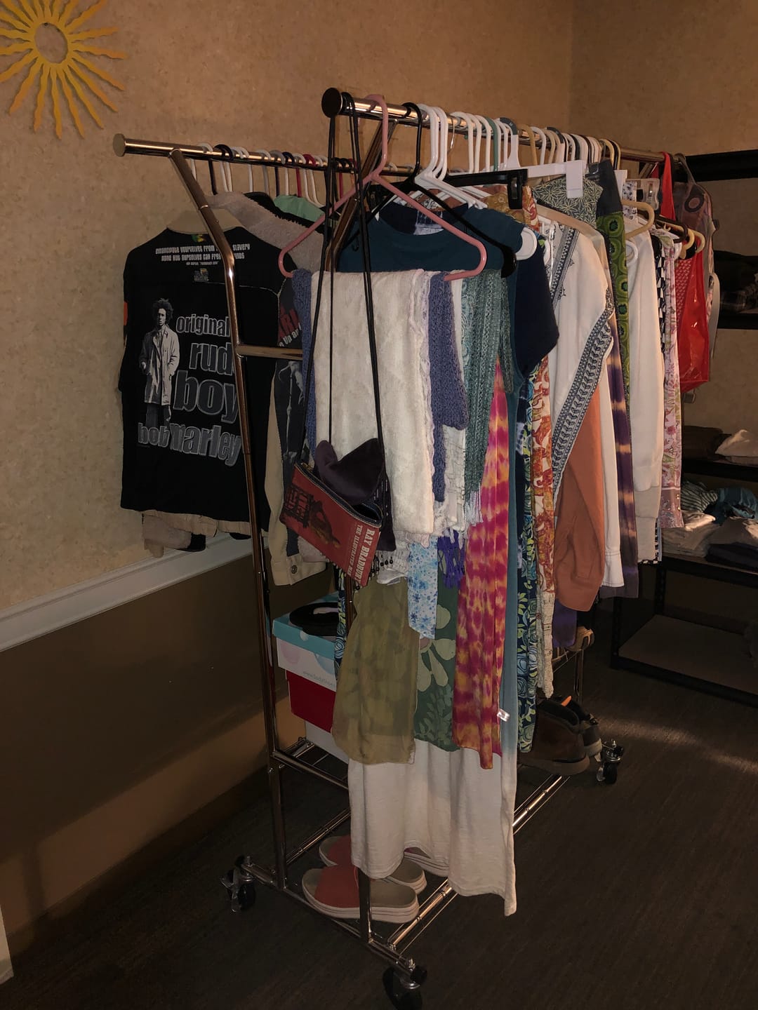 Customer photo review of Raybee 74"W Heavy Duty Clothes Rack on Wheels, 630LBS Adjustable Double Rod Garment Rack, Chrome Metal Commercial Clothing Rack with Storage Shelves