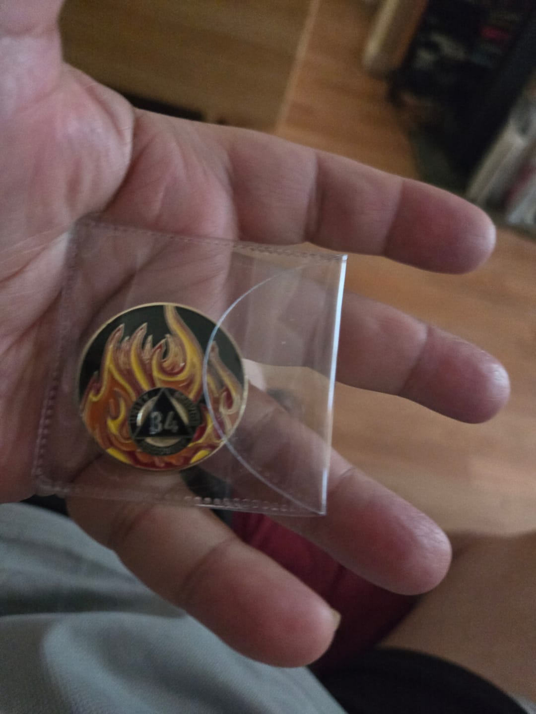 Customer photo review of 1 to 40 Year Sobriety Mint Twisted Flames Gold Plated AA Recovery Medallion/Chip/Coin - Black/Red/Orange/Yellow