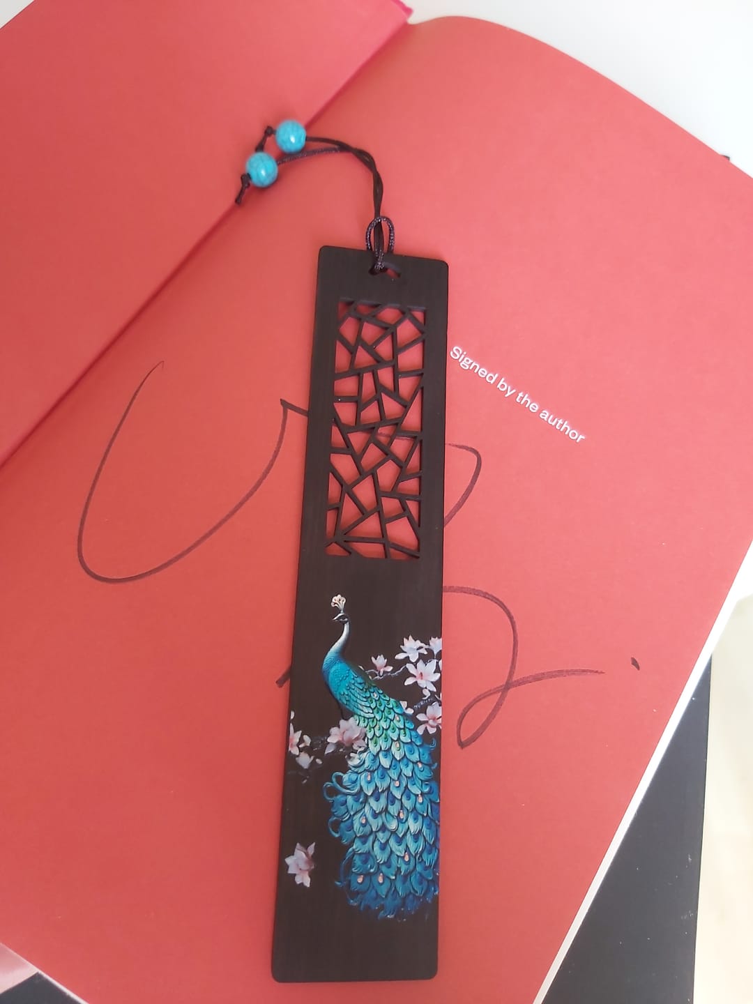 Customer photo review of Buddha Stones Blue Peacock Ebony Wood Bookmarks With Gift Box