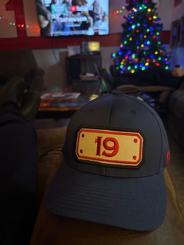 Customer photo review of FLEXFIT HOSE HAT WITH CUSTOM BACK OF HAT