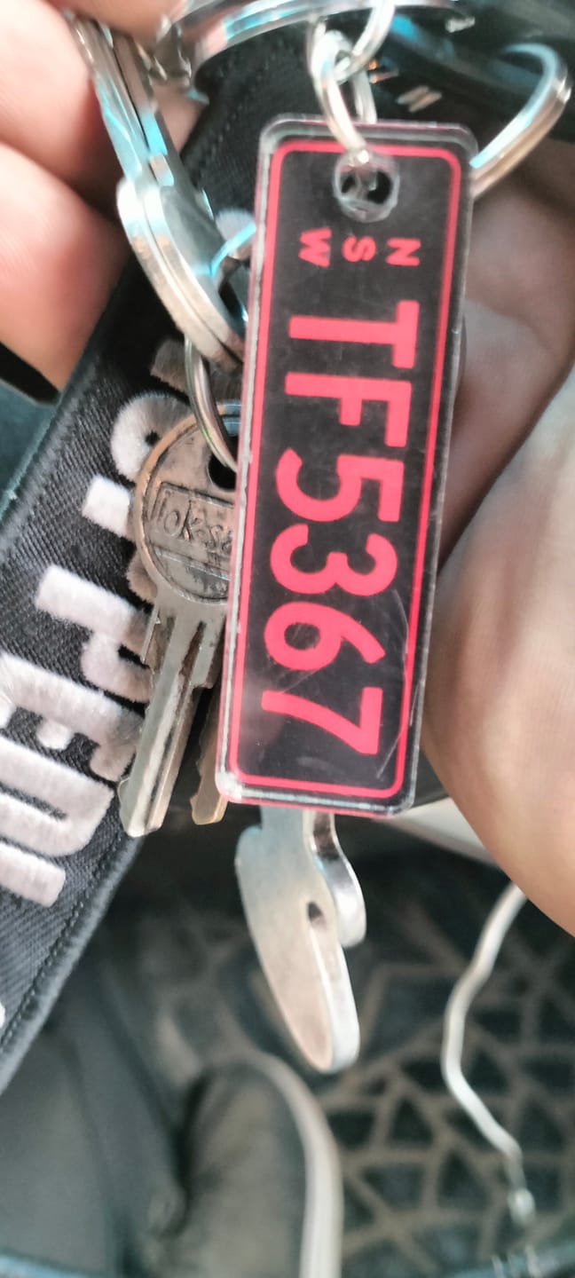 Customer photo review of NSW Colour on Black Licence Plate Custom Keychain