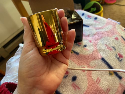 Customer photo review of 50 Caliber Brass Ceramic Shot Glasses - Set of 2