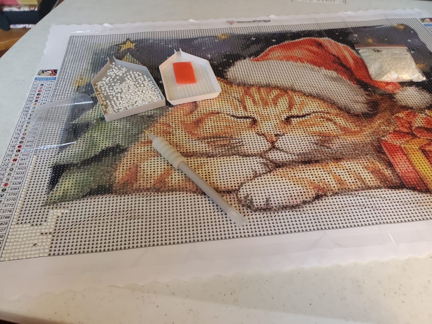 Customer photo review of Napping Christmas Kitty