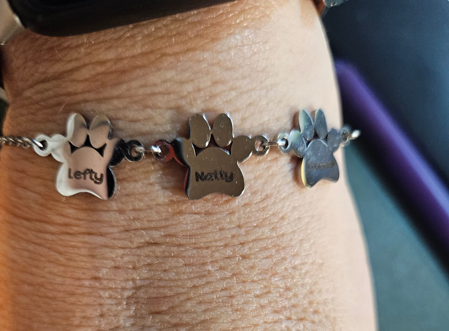 Customer photo review of Personalized Friendly Paw Name Bracelet