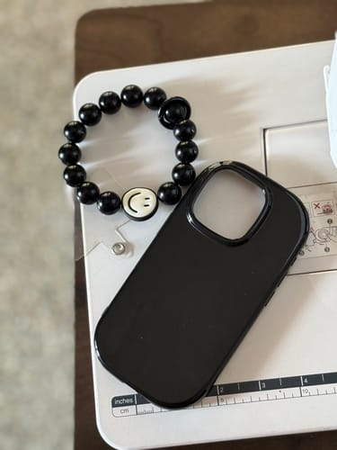 Customer photo review of Oval Shape Silicon Case With Hand Bracelet for iPhone ( Black )