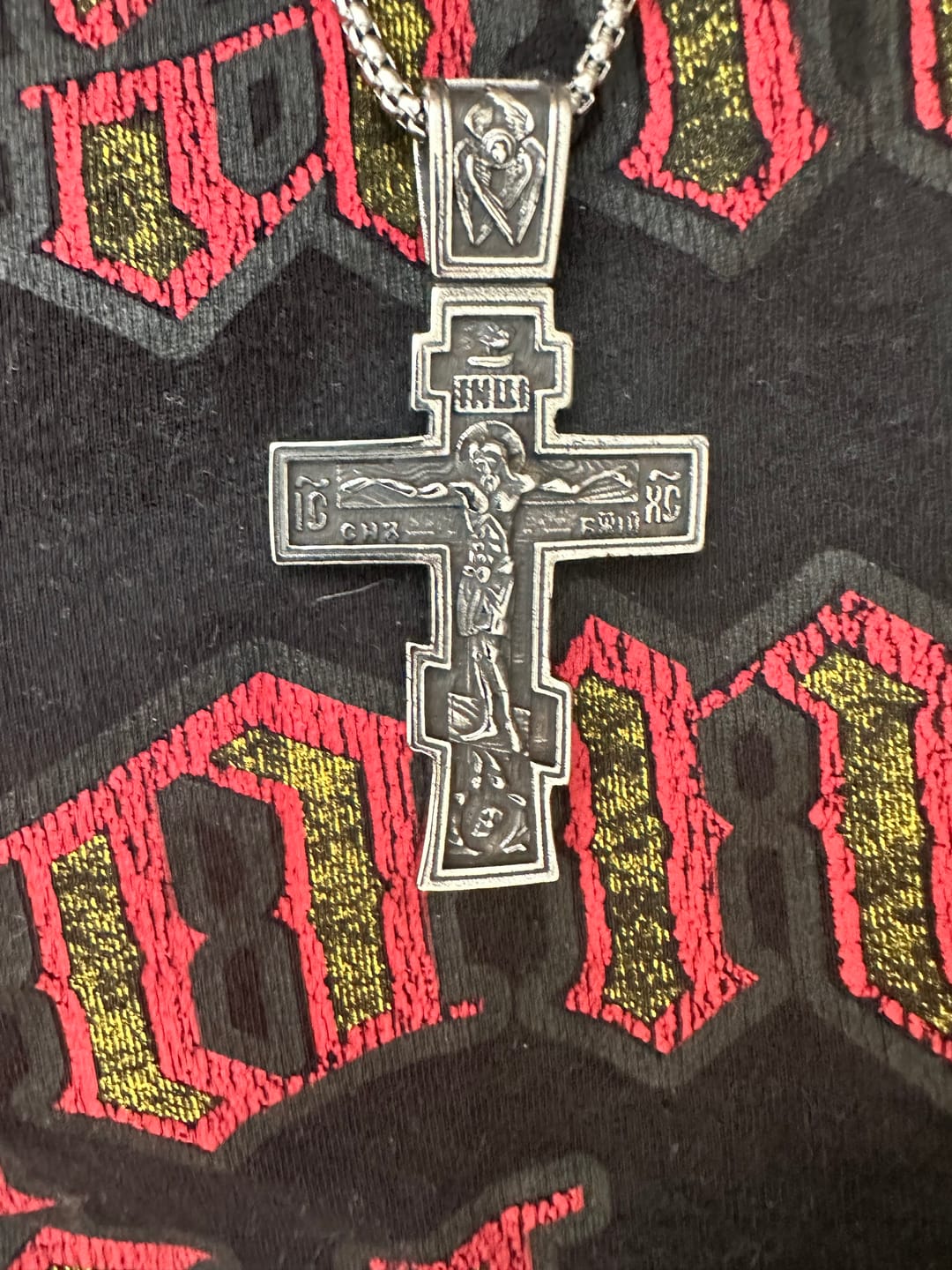 Customer photo review of DARK JESUS CROSS.