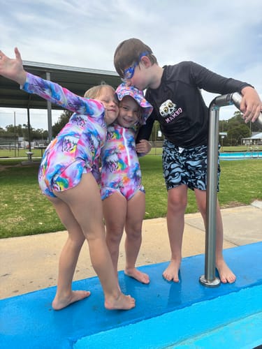 Customer photo review of Rainbow Horses Girls Long Sleeve Zip Swimmers