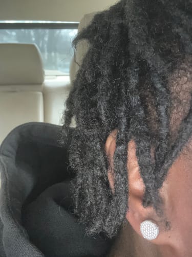 Customer photo review of 0.66 CTW Large Round VVS1 Moissanite Earrings