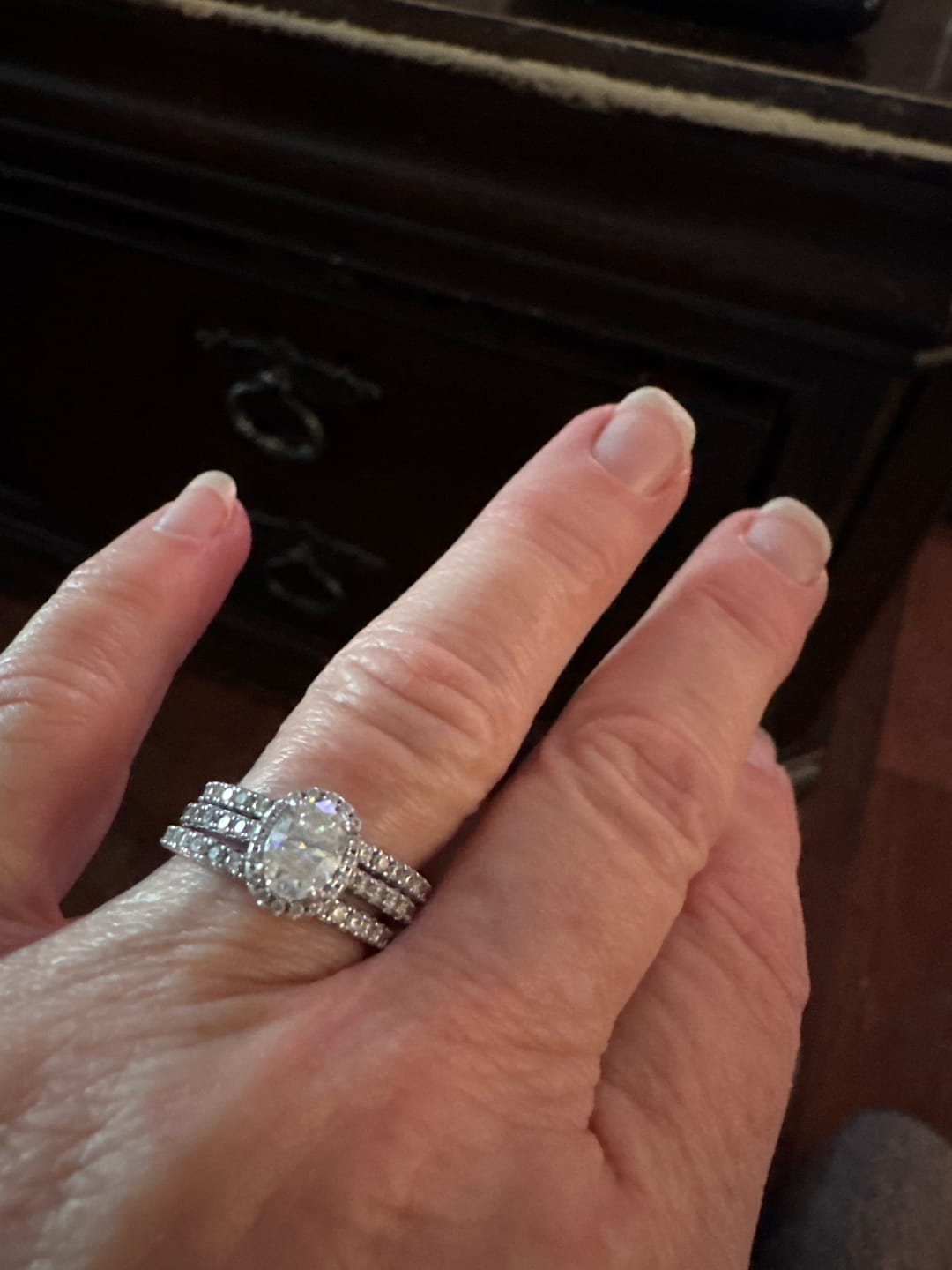 Customer photo review of Moissanite Round Half Eternity Sterling Silver Wedding Band Stackable Ring