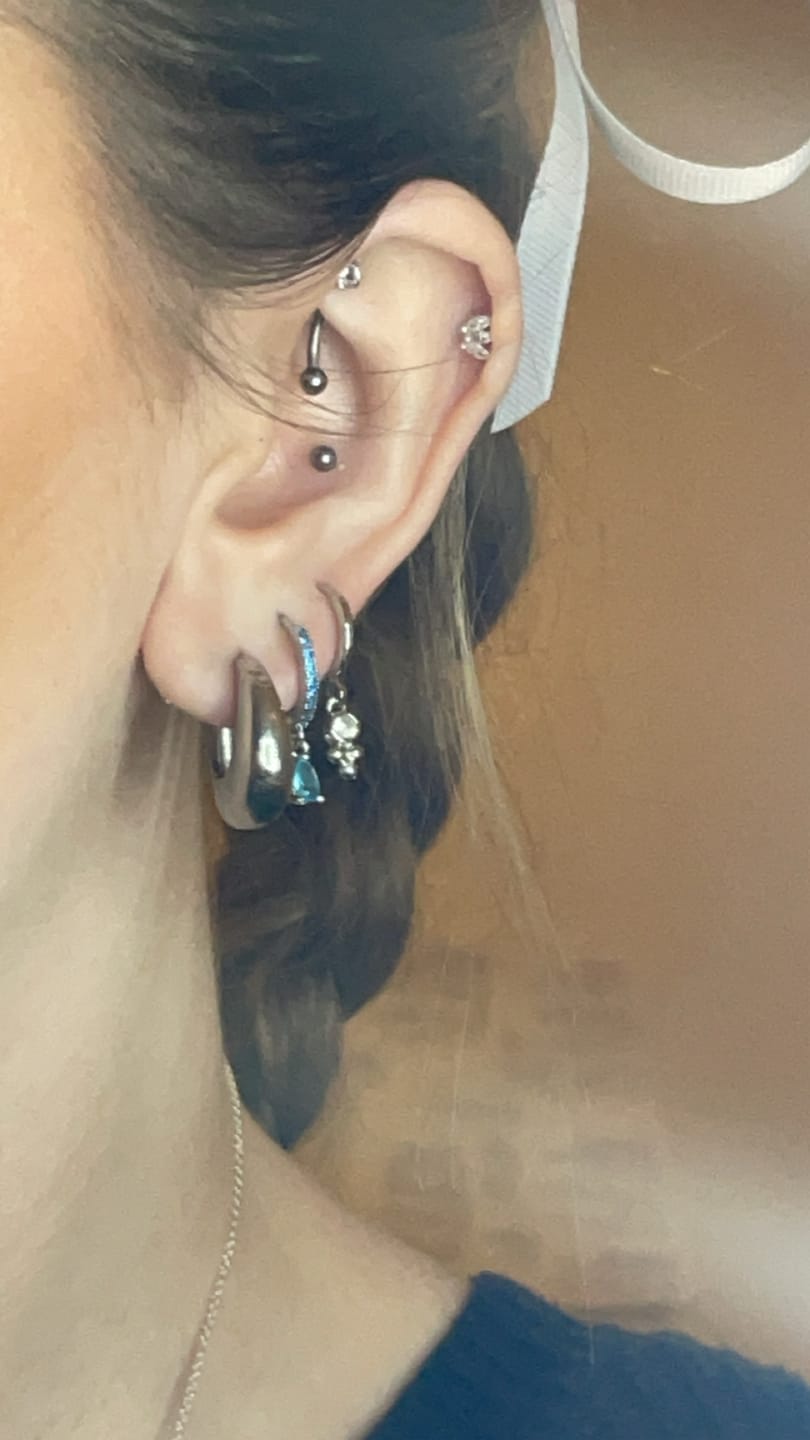 Customer photo review of Ottillie Turquoise Silver Raindrop Huggie Earrings