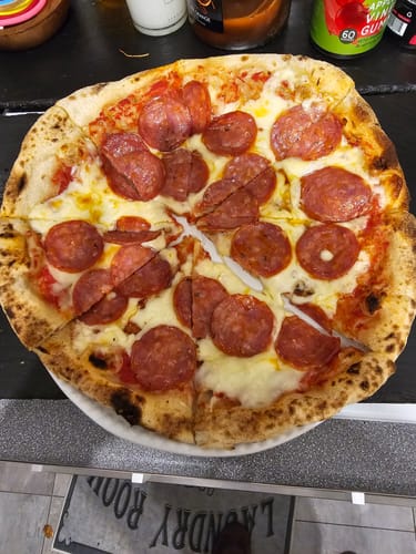 Customer photo review of Topped Pepperoni Pizza