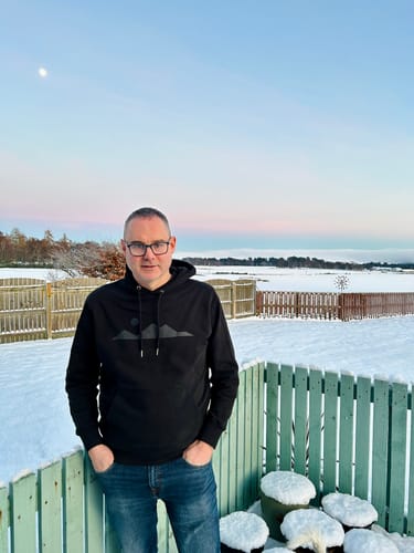 Customer photo review of More Mountains Blackout Hoodie