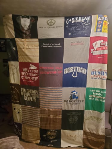 T-shirt quilt with travel, family themes by Laura from IN