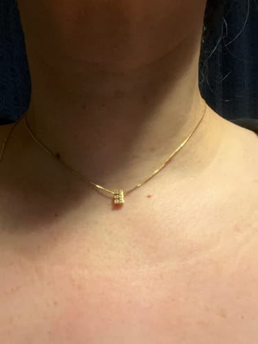 Customer photo review of Mini Iced Out Initial Necklace
