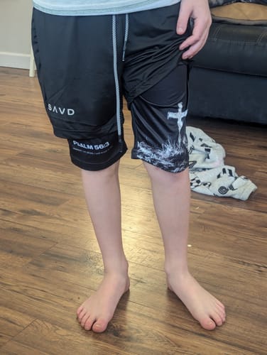 Customer photo review of Psalm 56:3 'Cross' Youth Performance Shorts