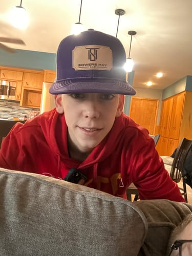 Customer photo review of Custom Leather Patch Trucker Hat - Richardson 112