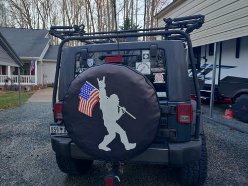 Customer photo review of Rock On Bigfoot Sasquatch American Flag ( COLOR ) Spare Tire Cover for Bronco, Jeep, RV Camper, & More
