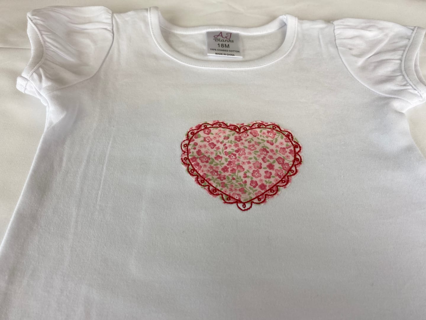 Customer photo review of Girl's Short Sleeve RUFFLE BOTTOM Shirts
