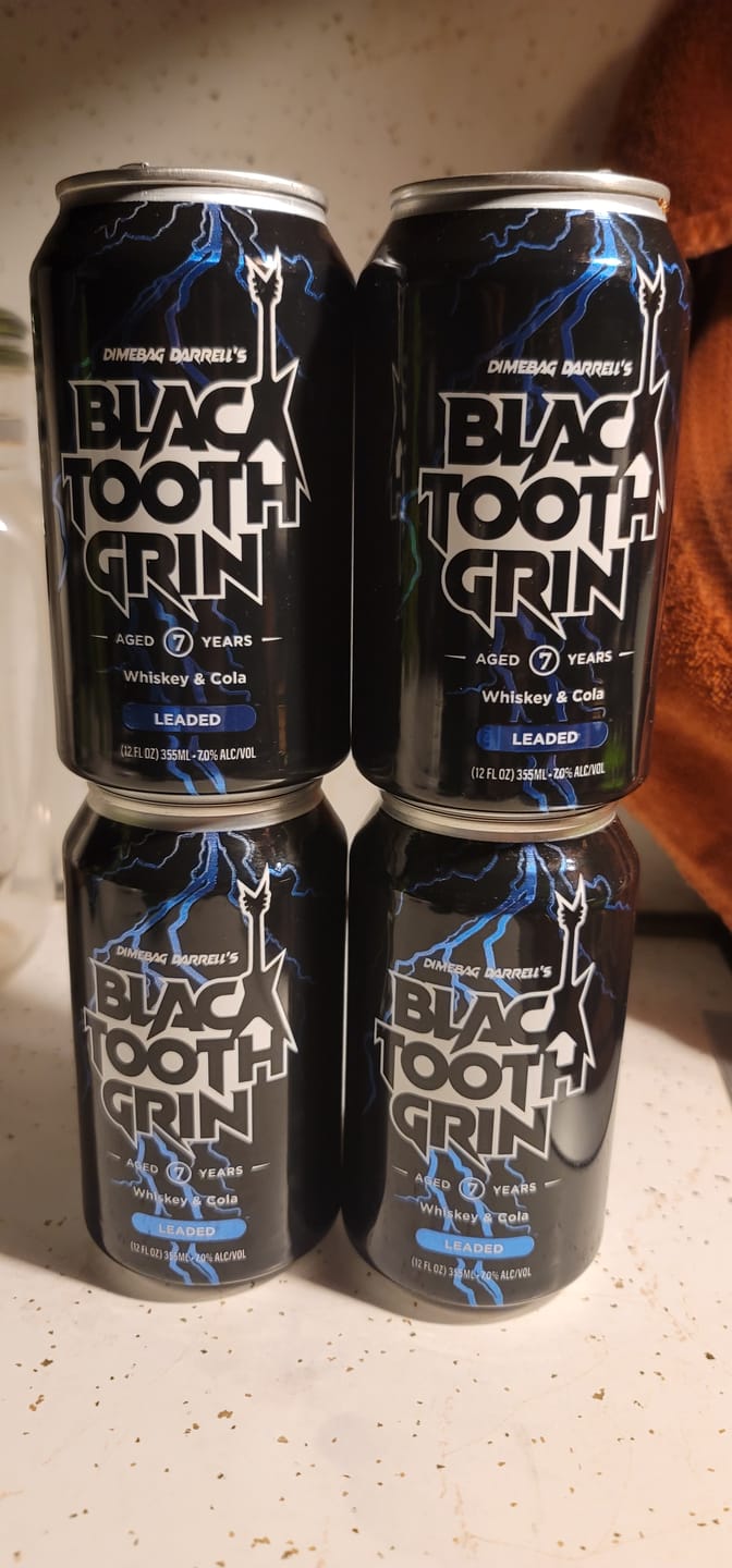Customer photo review of 7 YEAR BLACKTOOTH GRIN LEADED (4pk)
