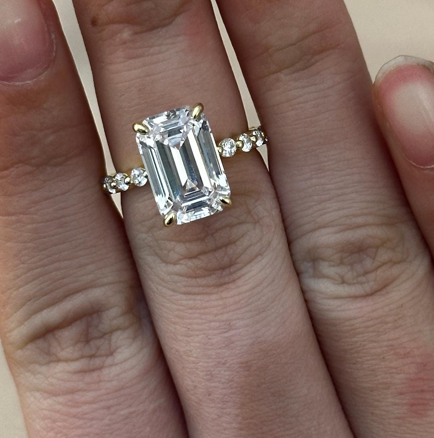 Customer photo review of Louily Desirable Emerald Cut Engagement Ring