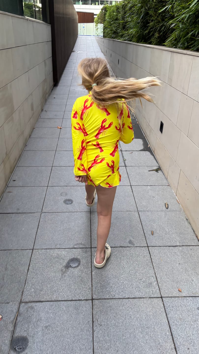 Customer photo review of Bright Lobster Girls Long Sleeve Zip Swimmers