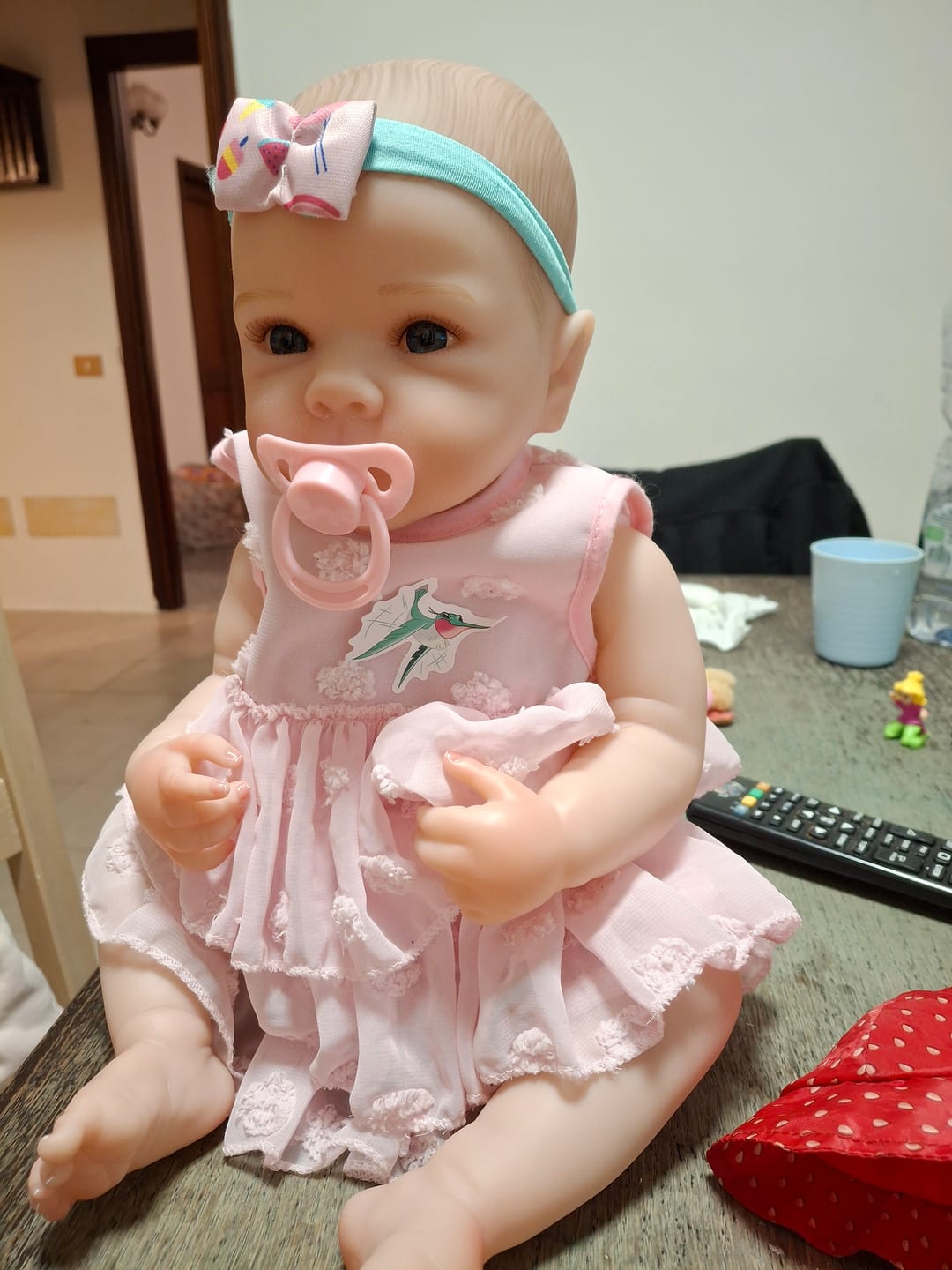 Customer photo review of Bambola reborn full silicone vinile altamente realistica - BETTIE