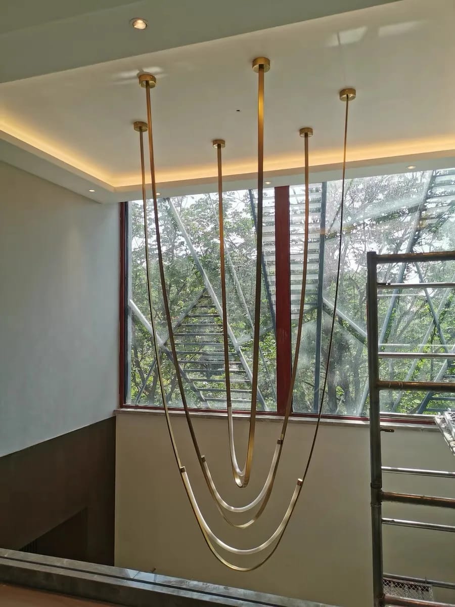Customer photo review of Gale Leather Belt Chandelier