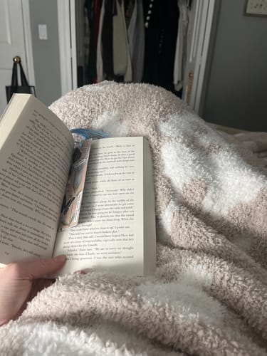 Customer photo review of Blushing Beige & White Cow Print Throw