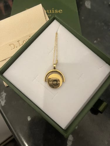 Customer photo review of Engravable Spinning Necklace