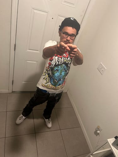 Customer photo review of Hellstar Studios Heaven On Earth Cream Tee