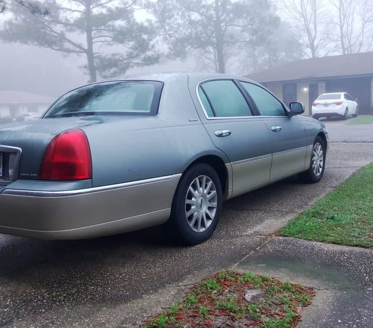 Customer photo review of 2003-2011 Lincoln Town Car Rear Air Suspension Conversion/Delete Kit with Rear Shocks (FA3RB)