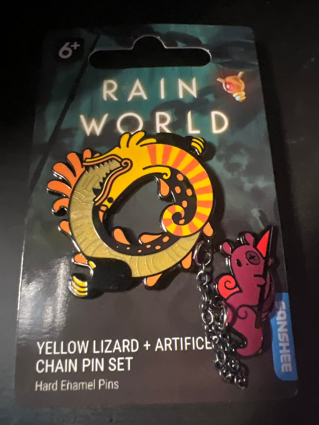 Customer photo review of Rain World - Yellow Lizard Hanger Pin