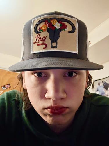 Customer photo review of Lazy J Ranch Dark Grey & White Skull & Flowers Classic Five Panel Trucker Hat