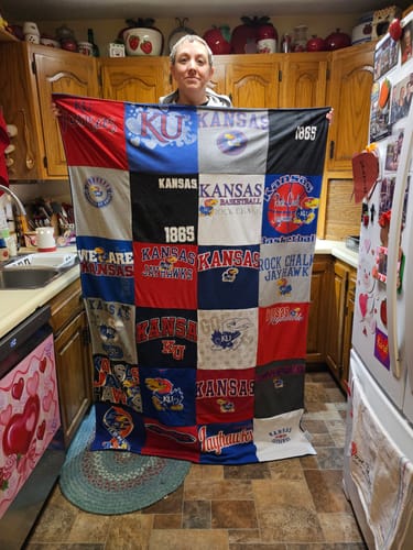 T-shirt quilt featuring university of kansas basketball team by AUDREY from IA