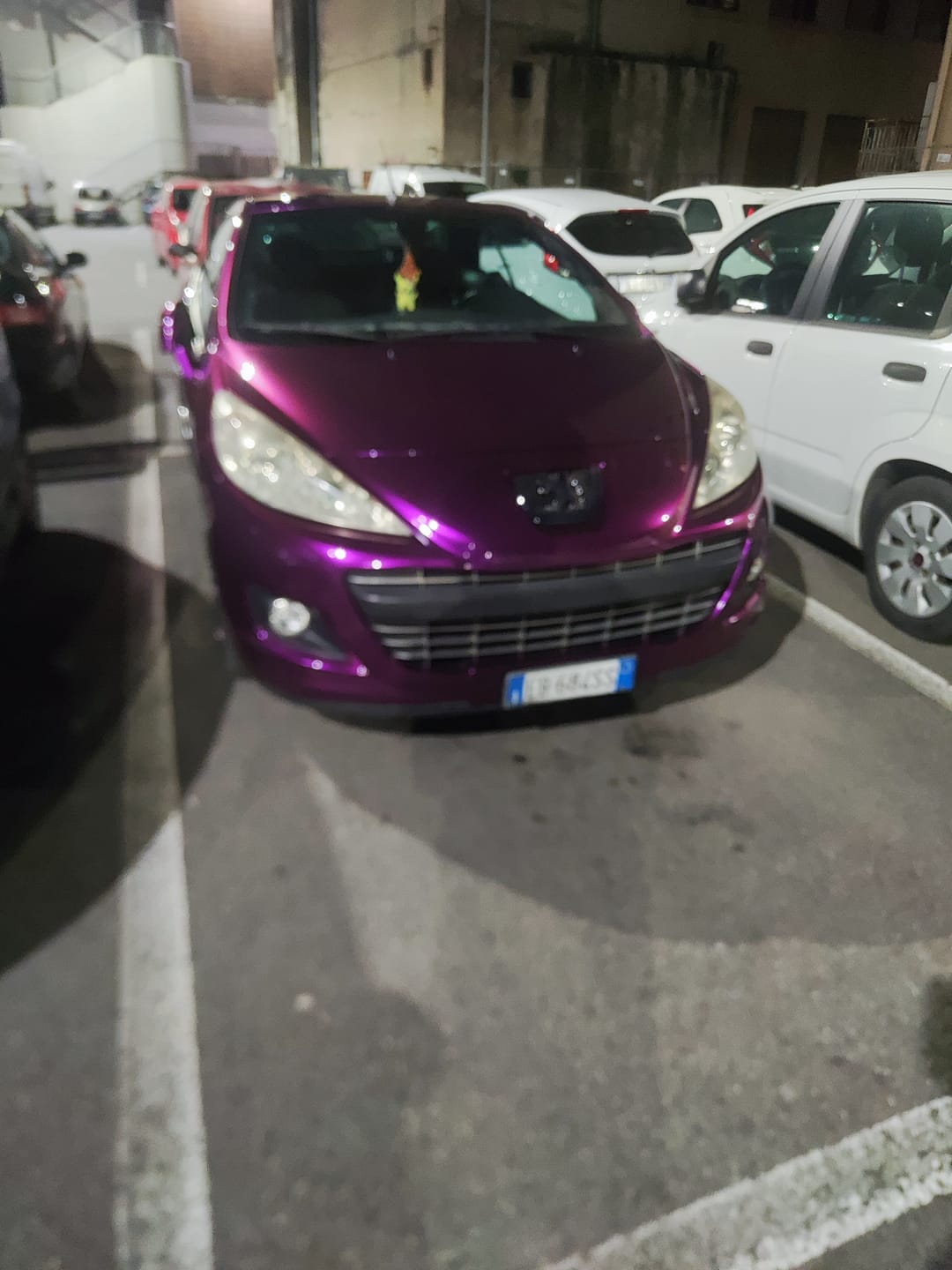 Customer photo review of Glossy Metallic Grape Purple Vinyl Wrap