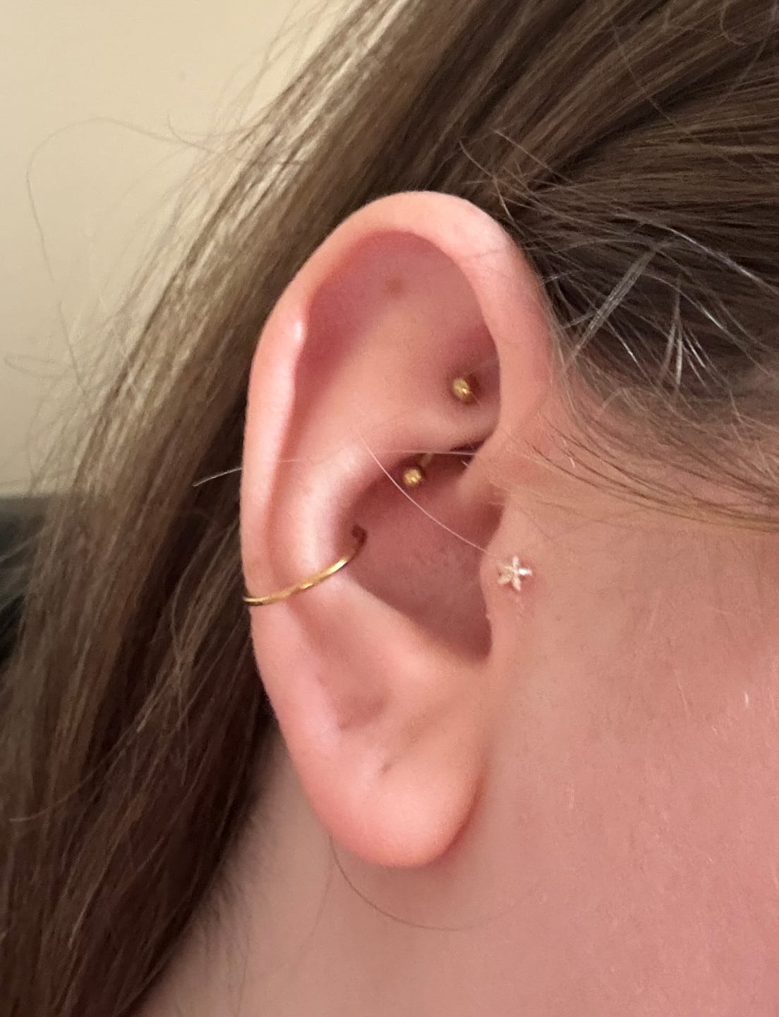 Customer photo review of STELLA Crystal Star Cartilage Stud - Threadless