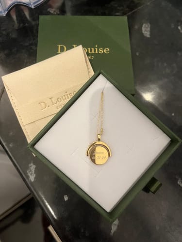 Customer photo review of Engravable Spinning Necklace