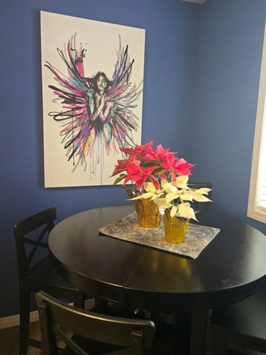 Customer photo review of 'Wings of Resilience' Framed Canvas
